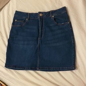 medium wash denim mini skirt from garage